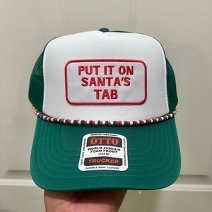 Tucker Hat - Put it on Santa’s Tab